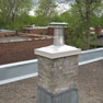 Chimney with a metallic crown cover